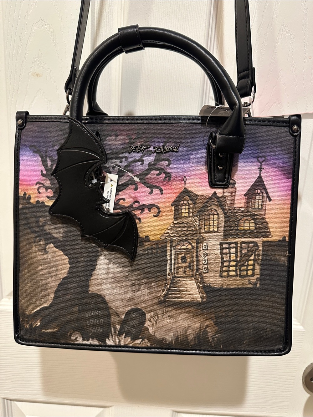 Betsey Johnson Black Haunted House purse with Bat Charm and Sunset Accent